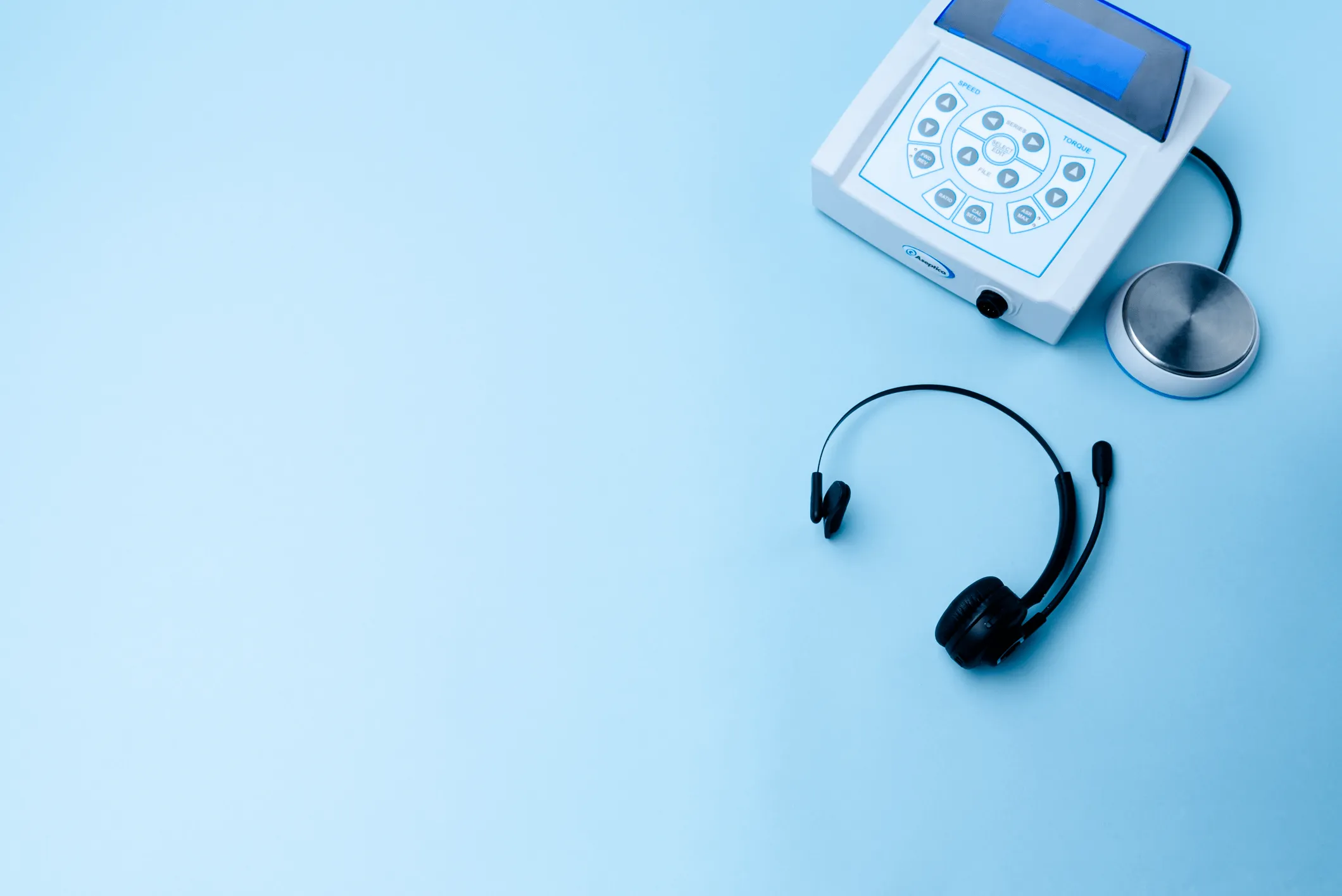 decorative photo banner of a support headset and a dental motor