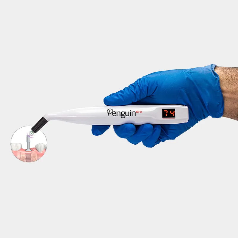Hand with blue glove holding a Penguin I unit hovering over a multipeg