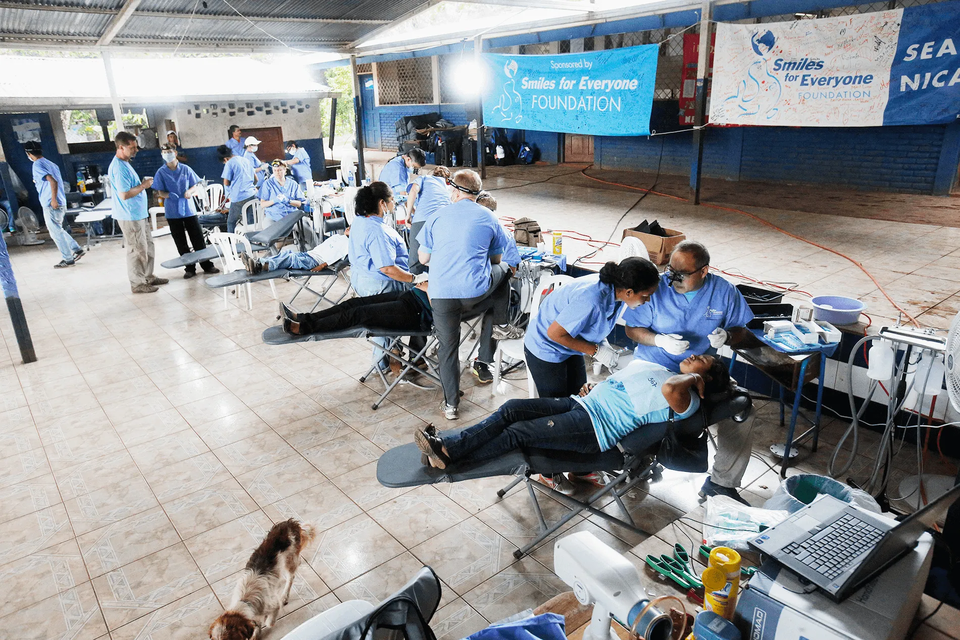 A photo of a group of people in a mission trip using aseptico products